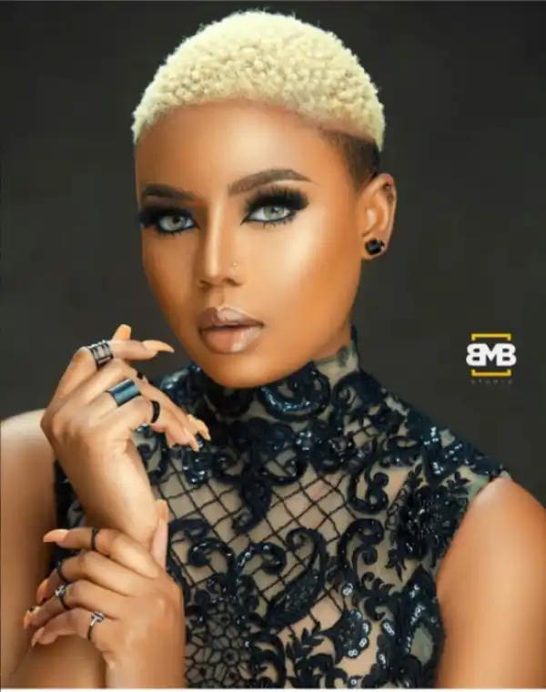 TV Host, Nancy Isime Carries A Snake Round Her Neck As She Visits 